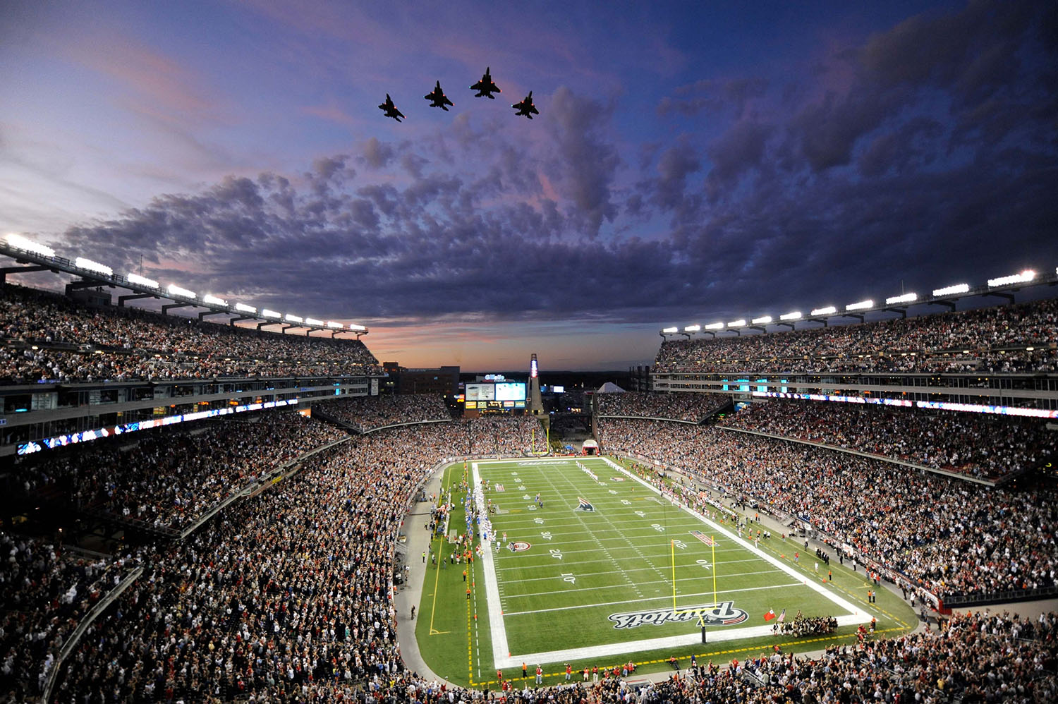 Four jets flying over the Gillette field.
